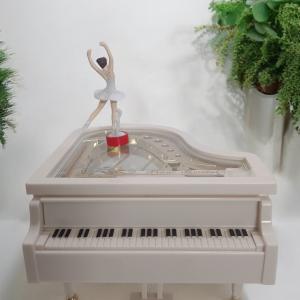 Elegant Dancing Lady on Piano Figurine - Perfect Blend of Art and Music