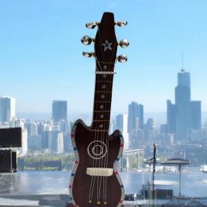 Artistic Miniature Guitar for Home Decor - Strings of Elegance